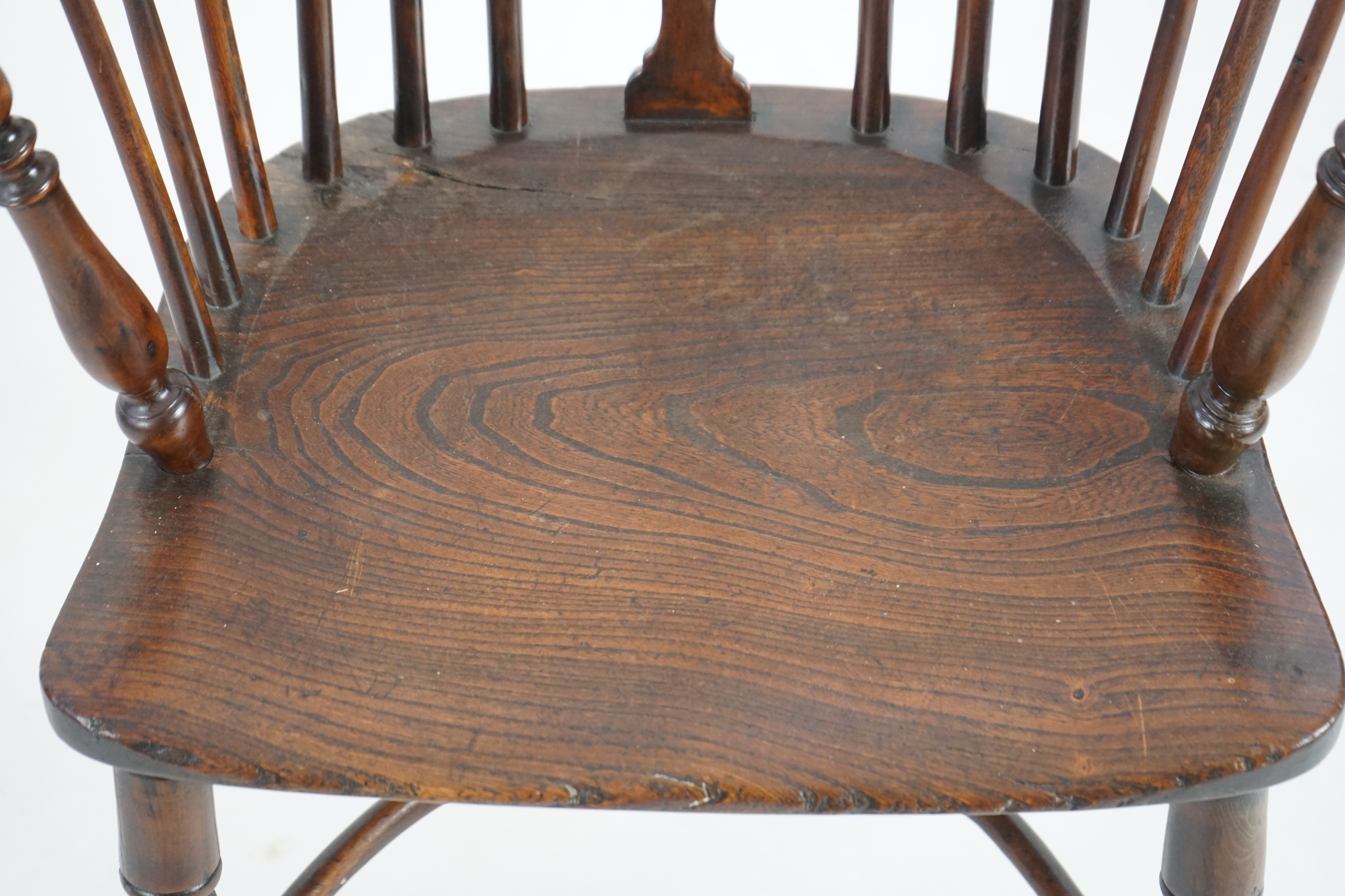 A mid 19th century yew, elm and ash Windsor chair